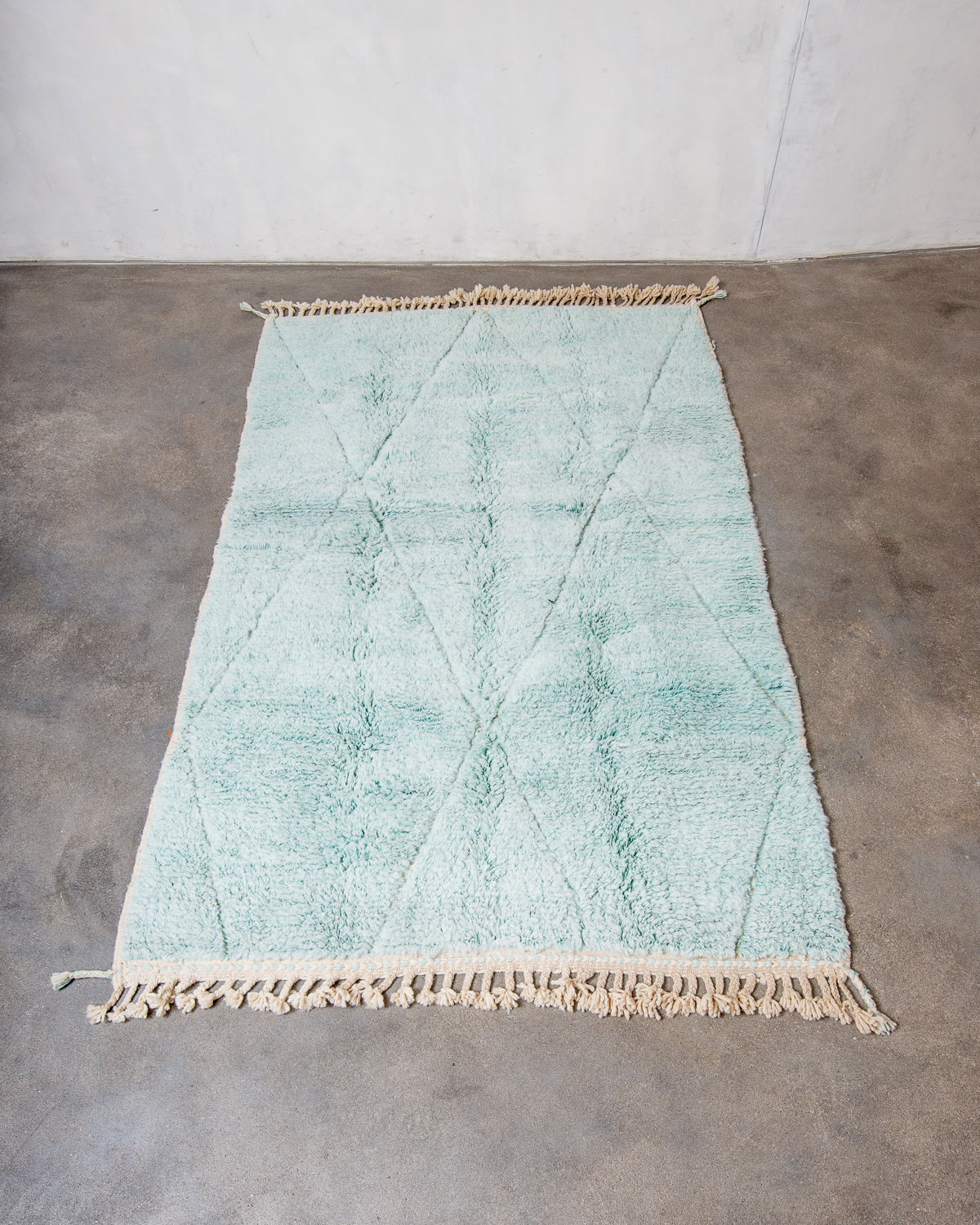 Modern, designer, handcrafted Berber rug from Morocco. Beniourain carpet with beautiful colours and patterns and fluffy wool texture.